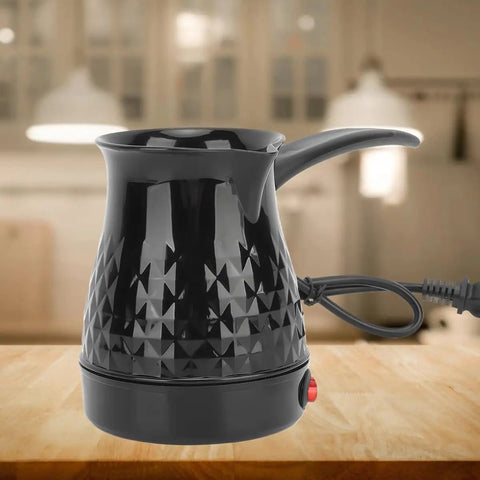 Black Electric Turkish Coffee Pot 600ml With 600W 110V Heat, ABS And Stainless Steel Turkish Coffee Maker With Removable Handle on table