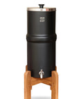2.25 Gallon Gravity Water Filter System With Dual Activated Carbon Filters, matte finish, on wooden countertop stand