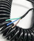 Heavy Duty Three Core Telescopic Extension Cord Self Retracting Power Cable With Beefy Protective Jacket showing coiled wires.