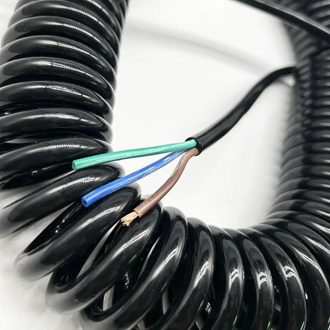 Heavy Duty Three Core Telescopic Extension Cord Self Retracting Power Cable With Beefy Protective Jacket showing coiled wires.
