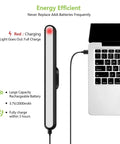 Dimmable Wall Reading Light With Magnetic Mount charging via USB-C cable next to laptop, red light indicates charging status.