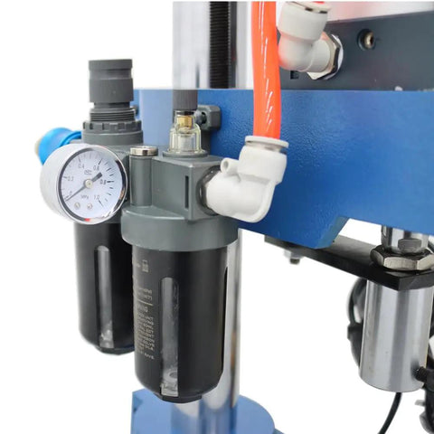 Close-up of pressure sensor and filters on Shop Approved Pneumatic Punch Press With Digital Display Controller and Adjustable Cylinder Stroke.