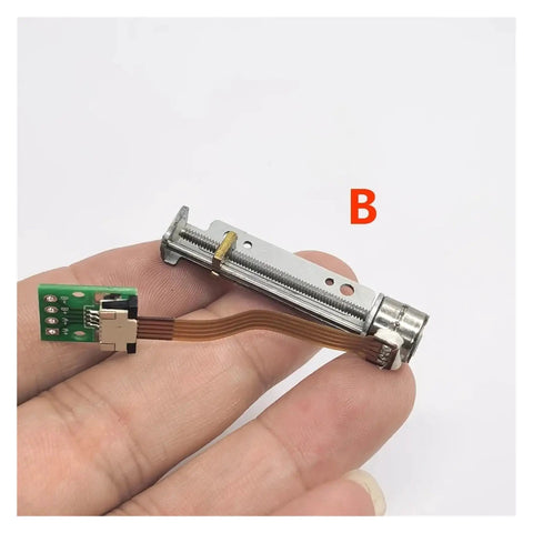 Rugged 24V DC Stepper Linear Actuator With 8Mm Shaft 2 Phase 4 Wire Motor High Efficiency IP54 Aluminum Housing in hand.