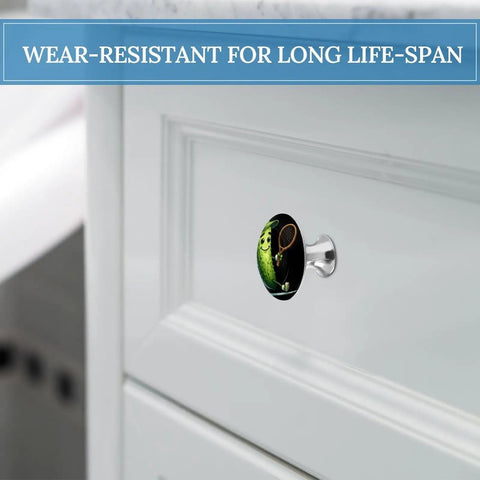 Funny Pickle Cucumber Tennis Themed Cabinet Knob on white drawer, aluminum alloy, stainless finish, 1.1in dia