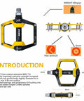Yellow and black aluminum mountain bike pedals flat pedals for MTB and BMX with removable non-slip studs nine sixteenths inch spindle durable platform pedal for trail riding and freestyle featuring side view and dimensions.