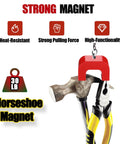 Red 30 lb horseshoe magnet clamping nails with pliers nearby
