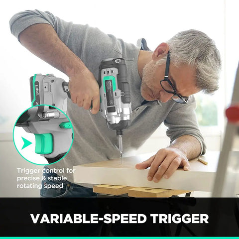 Man using 20V Cordless Impact Driver With One Quarter Inch Hex Quick Release Chuck, 1150 Inch Pounds Torque on wood