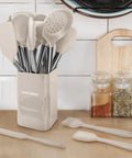 33 Piece Silicone Kitchen Utensil Set for Nonstick Pans with Stainless Steel Tools in holder on kitchen counter