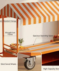 Dead On Mobile Food Cart With Retro Striped Awning And Slick Rolling Wheels For Street Vendors Portable Snack Stand With Lockable Storage Ready For Sick Outdoor Catering Runs features a rain-resistant canopy and spacious operating space.