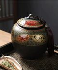 Slick Ceramic Airtight Storage Jar For Coffee Beans Sugar And Snacks Sleek Large Kitchen Container With Tight Seal Keeps Everything Crisp Down Home Vibes Total Game Changer on a wooden tray with loose leaf tea.