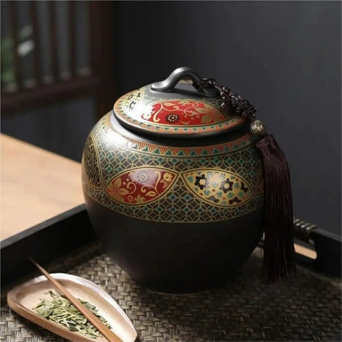Slick Ceramic Airtight Storage Jar For Coffee Beans Sugar And Snacks Sleek Large Kitchen Container With Tight Seal Keeps Everything Crisp Down Home Vibes Total Game Changer on a wooden tray with loose leaf tea.