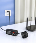 Universal AC DC Power Supply Adapter 72W Adjustable 3V To 24V Output With Voltage Display connected to a router