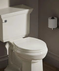 Brevia Round Toilet Seat With Quick Release Hinges And Quick Attach Hardware For Easy Clean Biscuit Color with Grip Tight Bumpers