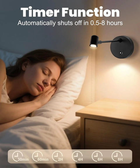 Lit Wireless Battery Operated Picture Light With 3 Color LED illuminating a wall with woman sleeping nearby, remote timer in use.