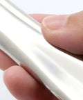 Close-up of hand holding Round Tube Stainless Steel Handle For Drawers And Cabinets Rustproof Kitchen Hardware Universal Mounting Drawer Pull