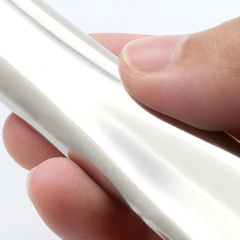 Close-up of hand holding Round Tube Stainless Steel Handle For Drawers And Cabinets Rustproof Kitchen Hardware Universal Mounting Drawer Pull