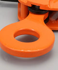 Close-up of orange swivel shackle on Heavy Duty 3 Ton Vertical Plate Lifting Clamps For Steel Weight Plates And Construction Sites.