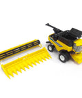 One Sixty Fourth Scale Farm Combine With Corn And Grain Headers Die Cast And Plastic Construction For Collectors shown with headers detached