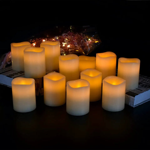 Flameless Battery Operated Pillar Candles Set Of 12 Real Wax Pillars With Dancing LED Flames 3 Inch By 4 Inch Ivory glowing in dark