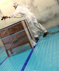 Painter using Aqua Shield Surface Protector 10 Mil 36 Inch By 100 Foot Heavy Duty Protective Film during painting project