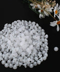 300 Piece Pack Of 7Mm White Stem Furniture Bumpers For Glass Tables And Patio Chairs Delivering Zero Hassle Install To Shield Floors From Scratches While Keeping Things Smooth And Your Setup Looking Sharp, showing a pile of white plastic bumpers.