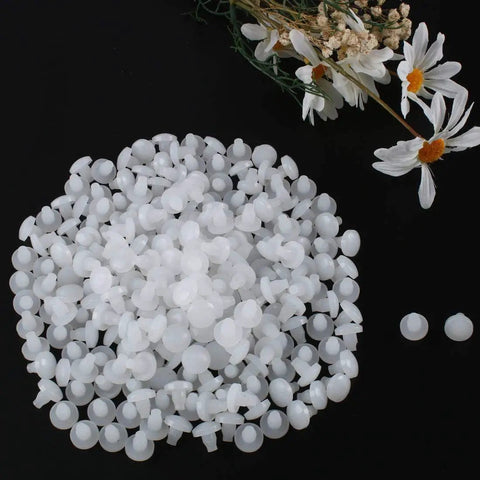 300 Piece Pack Of 7Mm White Stem Furniture Bumpers For Glass Tables And Patio Chairs Delivering Zero Hassle Install To Shield Floors From Scratches While Keeping Things Smooth And Your Setup Looking Sharp, showing a pile of white plastic bumpers.