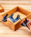 Clamp It Mini Assembly Squares 4 Pack For 90 Degree Corner Clamps In Woodworking shown in use with wooden box assembly