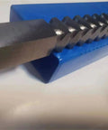 Close-up of 22mm Square Push Type Broach Cutter for Keyway, HSS High Speed Steel cutting tool on blue surface