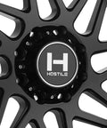 Close-up of 22X12 Satin Black Truck Wheels With 6X135 Bolt Pattern And Minus Forty Four Offset detailing stylish spoke design.