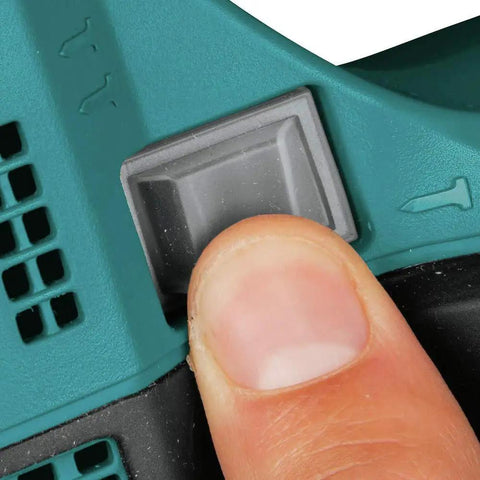 Close-up of finger pressing button on Cordless 18V LXT 16 Gauge Straight Finish Nailer, 2-1/2 Inch Nails, Powerhouse Trim Gun