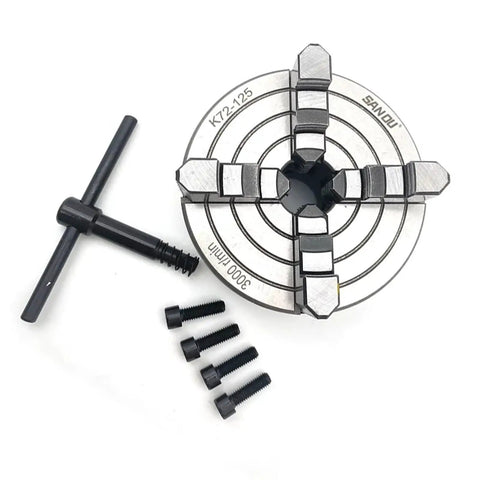 Top Shelf Four Jaw Lathe Chuck 125 Millimeter Single Movement Rig Built Tough With Heavy Alloy showing steel jaws and mounting screws.