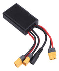 Heavy Duty Dual Battery Pack Balance Discharger With Snap Ready Charging Port And Steady 40A Output For 20V To 72V Boards Plus Smart Balancing Tech showing a black adapter with cables.