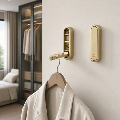 Sleek Black Folding Wall Hooks Four Pack With Swivel Hinge Design Perfect For Tight Spaces And Narrow Hallways No Hassle Kickback Mount holding a coat.