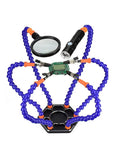 Third Hand Soldering Table Clamp With 3X Magnifier And Five To Six Arms Flexible Gooseneck Helping Hands For PCB Holder Welding Repair Tool Kit Adjustable Stainless Steel Alligator Clips For Hobbyists displaying PCB on stand with clamp and magnifier
