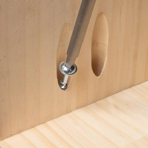 Pocket Hole Screws 1-1/4 Inch Coarse Thread With Maxi-Loc Head inserted in wood for pocket hole jigs