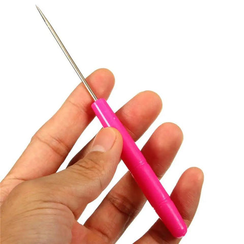 Six Piece Stainless Steel Cookie Scribe Tools And Sugar Stir Needles Ideal For DIY Bakers Who Want Hella Crisp Scoring Lines And Clean Icing Guidelines With Zero Hassle On Every Single Batch, pink handle needle held in hand.