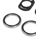 Close-up of two metal bearings from Complete Mountain Bike Headset Kit With CNC Machined Spacers, Top And Bottom Covers, Bearings, Fork Expander Plug