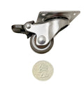 Smooth Ride One Inch Caster Set Packs Two Swivel Casters With Locking Pads And Self Tapping Screws, shown with a quarter for size comparison.