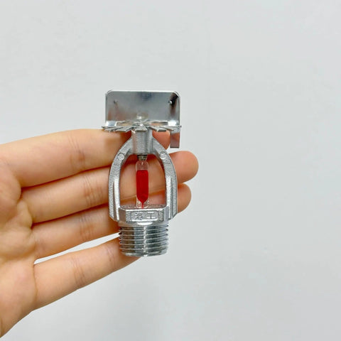 Premium Sidewall Fire Sprinkler Head 1 Inch DN25 Threaded 155F Automatic Heat Activation 2 Pack in hand for fire safety.