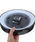 Quartz Wall Back Cover For 12 Inch Round Clock Replacement Rear Panel Shell And Backplate held by a hand, black and white design.