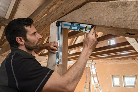 No Sweat Heavy Duty Digital Angle Finder Miter Calculator Protractor Level being used by a builder for precise measurements.