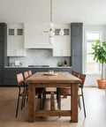 Top Shelf Saddlewood Reactive Interior Wood Stain Water Based VOC Free Blend Brings A Heavy Duty Warm Leather Vibe To Rustic Ranch And Craftsman Spaces Pro Grade Smooth Roll Out Massive 55 Gallon Drum Finish in modern kitchen with wooden table and dark cabinetry.