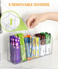 Game Changing Drink Packet Organizer With Adhesive And Magnet Mount For Fridge Cabinet Featuring Slide Out Dividers with removable dividers and assorted drink packets.
