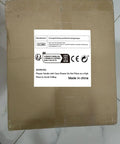 Plug And Play Automatic Granular And Powder Filling Machine Quantitative Dispenser boxed for shipping with warning label and manufacturer info.