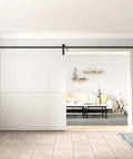 10 Foot Barn Door Hardware Kit For Single Sliding Door Heavy Duty Black Carbon Steel Track And J Shape Rail Includes All Necessary Hardware For Quick Smooth Installation For A 65 Inch Closet Panel No Door installed in a living room