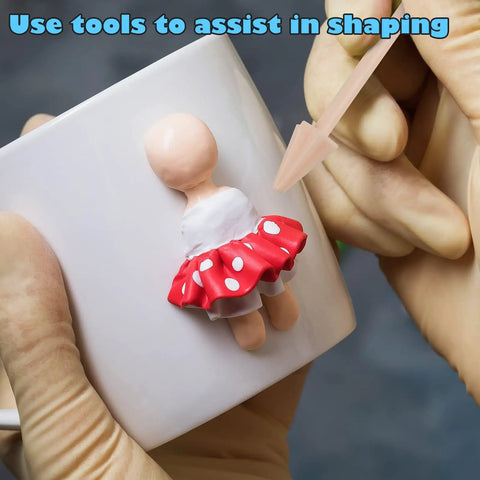 Shaping clay figure using tools from Polymer Clay Starter Kit With 82 Colors, 100 Pc Value Pack In Individually Wrapped Blocks, Oven Bake Modeling Clay For Kids And Beginners, DIY Craft Set With Tools For Sculpting And Molding, highlighting use of shaping tools.