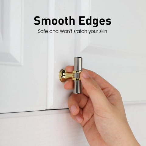 Hand installing two tone brushed nickel and gold cabinet knob on white cupboard door, smooth edges visible.
