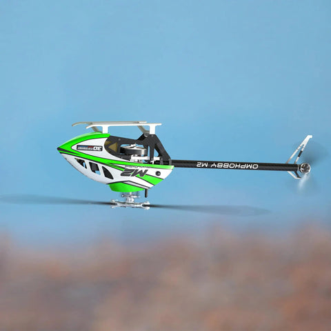 Green and white M2 V3 Sport BNF RC Helicopter For Adults With OFS3 Plus Flight Controller R40X3 Brushless Motor in flight