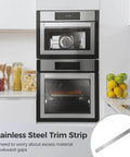 Installed Durable 304 Stainless Steel Trim Strip With Adhesive Backing in kitchen, shown around cabinet edge, close-up view.