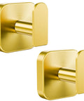 Heavy Duty Self Adhesive Wall Hooks Built Different, Stainless Steel Sticky Towel Holder With Knockout Grip For Bathroom Shower Or Kitchen, Hang Heavy Coats Without A Sweat, Gold Finish, 2 Pack, close-up view.